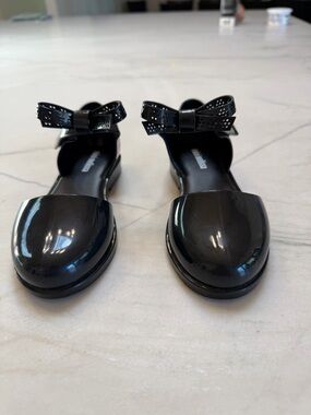 Mini Melissa Black Patent Bow Ankle Strap Flats